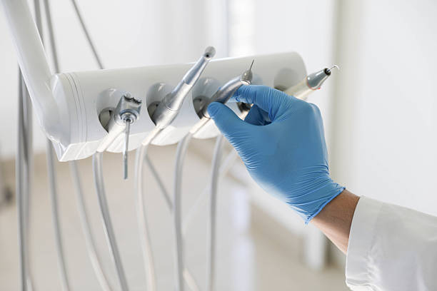 Professional Root Canal Treatment technician working in Paden City, WV